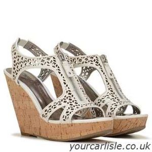 Carlos Santana Wedges